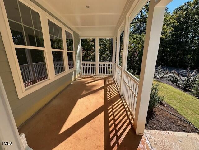 7701 Litcham Drive Raleigh, NC 27615 - Photo 54 of 58 a view of a house with a porch