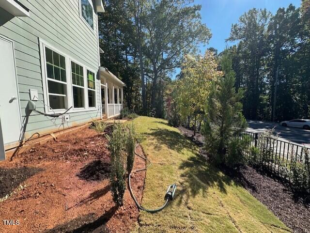7701 Litcham Drive Raleigh, NC 27615 - Photo 55 of 58 a view of a house with backyard and sitting area