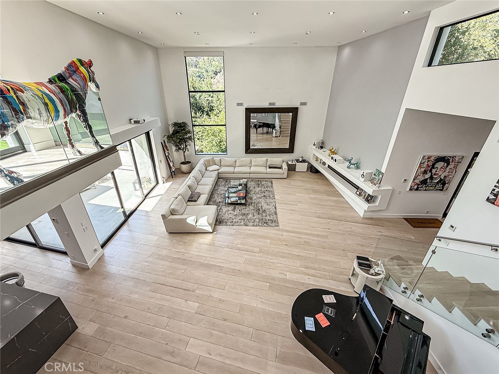 158 Bell Cyn Road Bell Canyon, CA 91307 - Photo 15 of 53 a view of a living room with furniture and a flat screen tv
