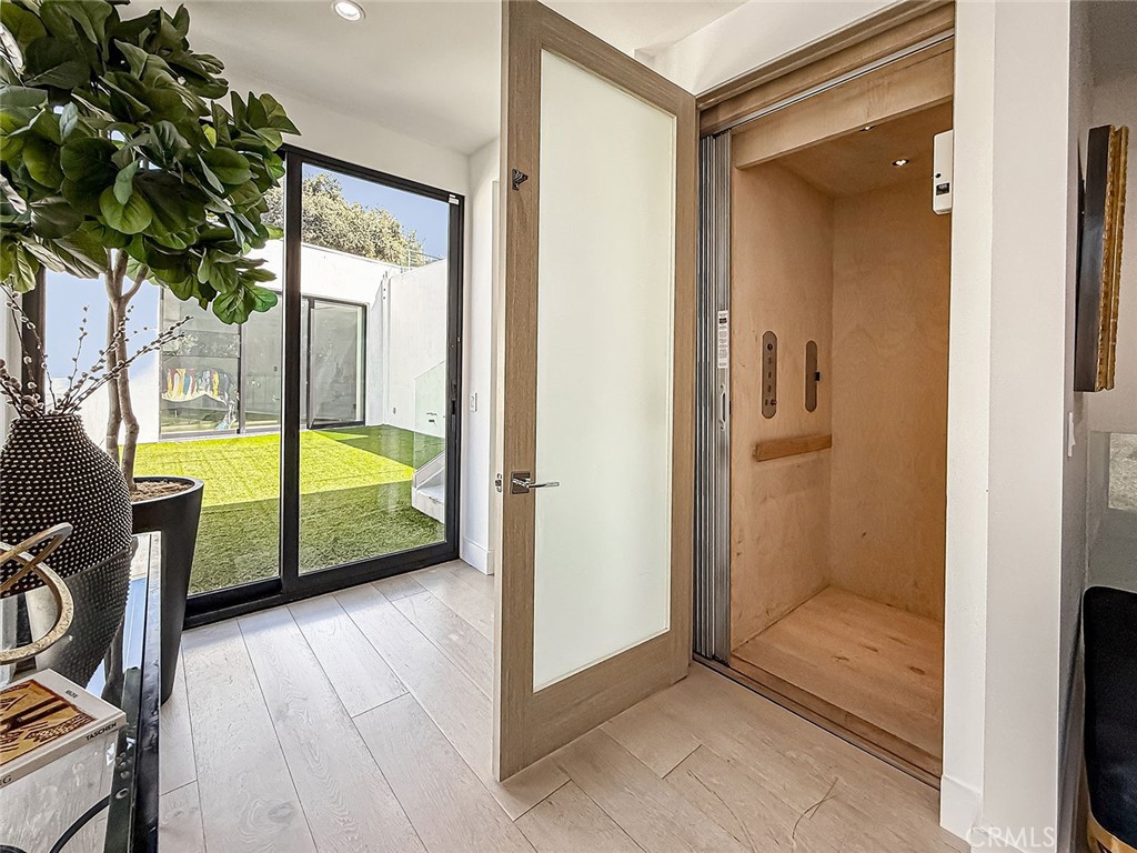 158 Bell Cyn Road Bell Canyon, CA 91307 - Photo 20 of 53 a view of a room that has a bed and wooden floor