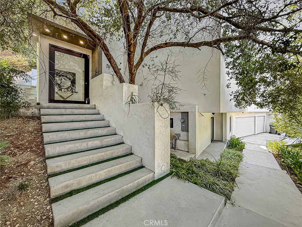 158 Bell Cyn Road Bell Canyon, CA 91307 - Photo 2 of 53 a view of a house with a large tree