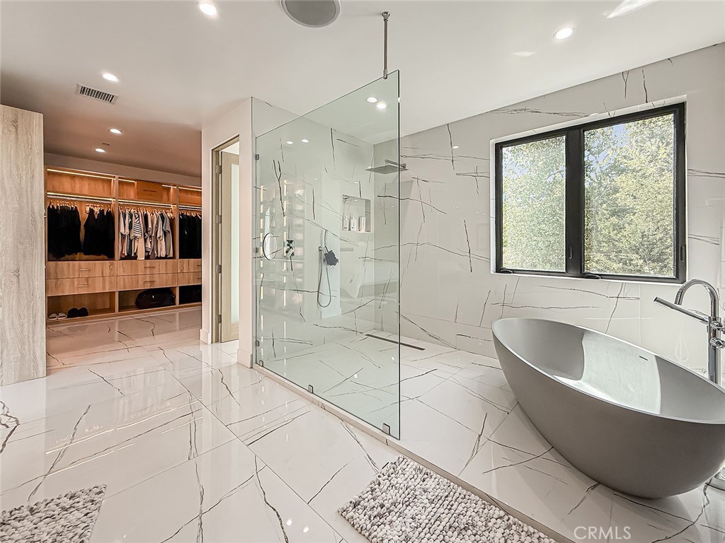 158 Bell Cyn Road Bell Canyon, CA 91307 - Photo 27 of 53 a large spacious bathroom with a large tub shower and windows