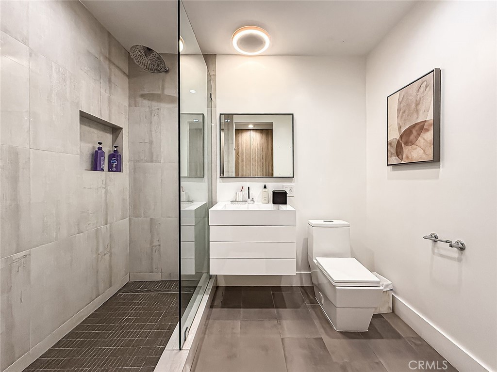 158 Bell Cyn Road Bell Canyon, CA 91307 - Photo 33 of 53 a bathroom with a sink a toilet and shower