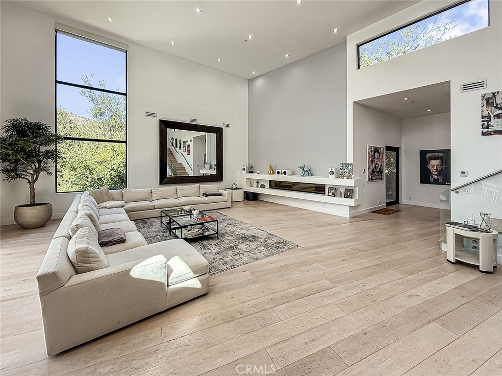 158 Bell Cyn Road Bell Canyon, CA 91307 - Photo 4 of 53 a living room with furniture and large windows