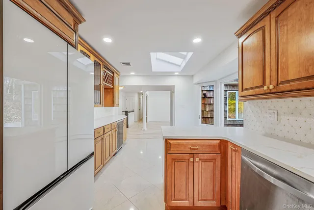 a hallway with cabinets