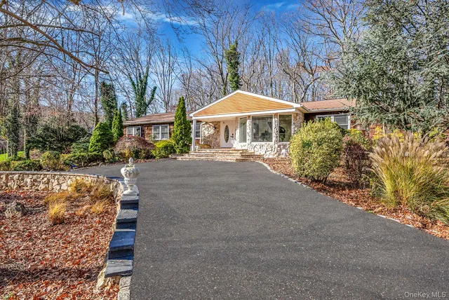 a view of a patio with a yard