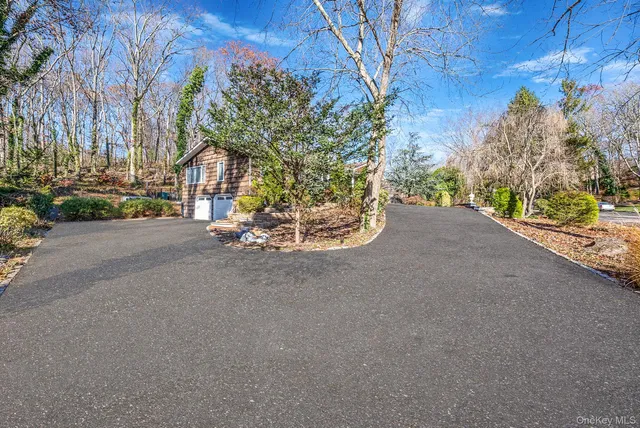 a view of a house with a street