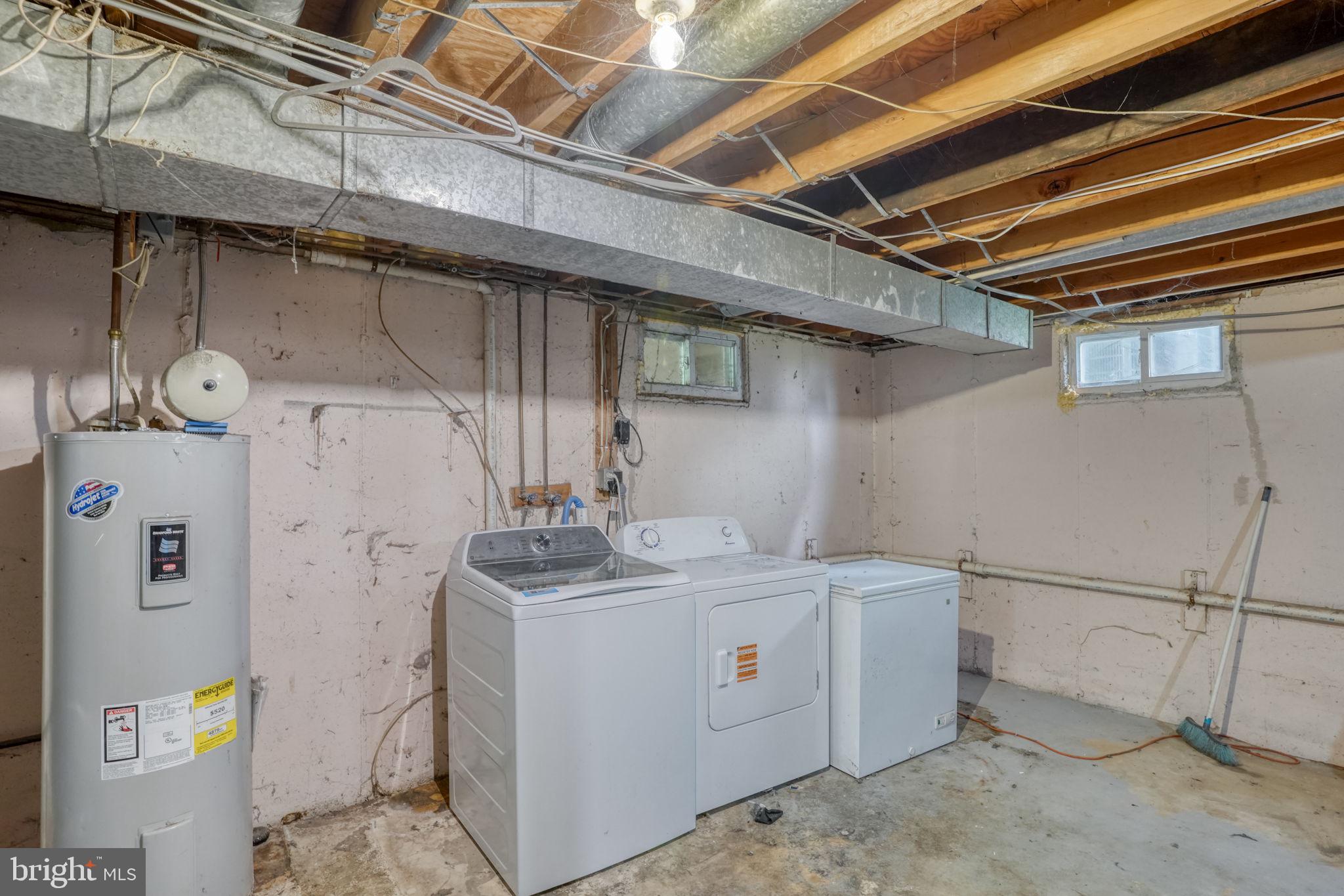 8 Yorktown Road New Castle, DE 19720 - Photo 21 of 22 Functional basement laundry space.