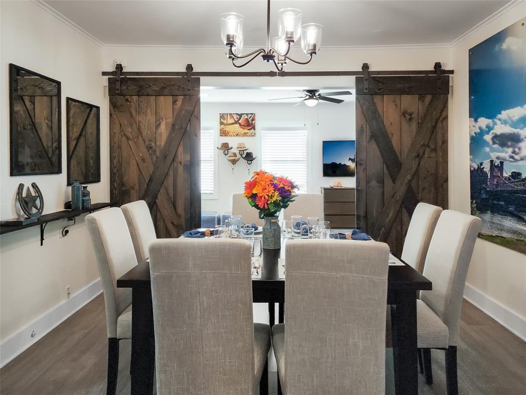 2800 McKenzie Avenue Waco, TX 76708 - Photo 16 of 40 a dining room with furniture a chandelier and window
