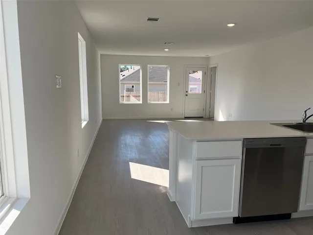 a view of an empty room and window