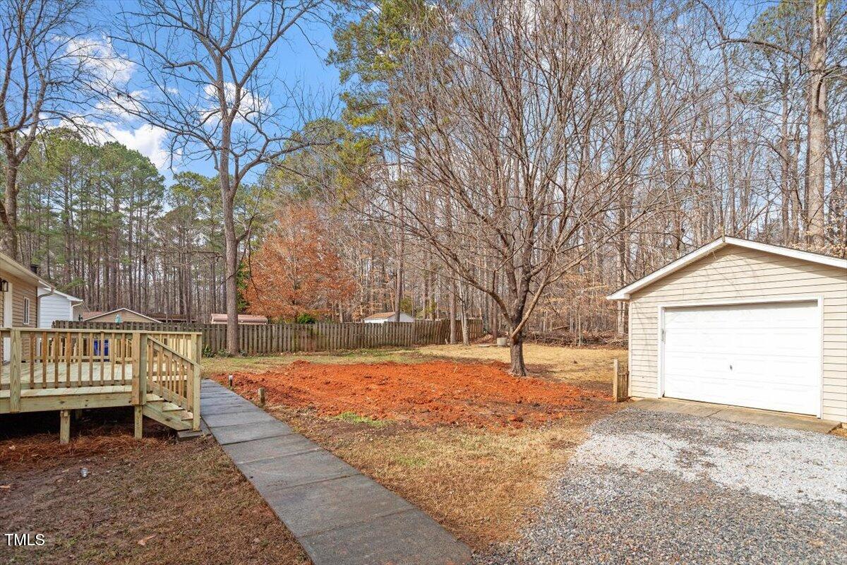 4720 Brigadoon Drive Durham, NC 27705 - Photo 25 of 25 a front view of a house with a yard
