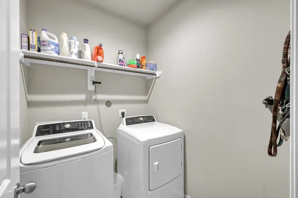 a utility room with dryer and washer