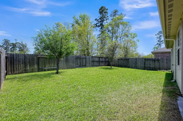 a view of a yard with a slide