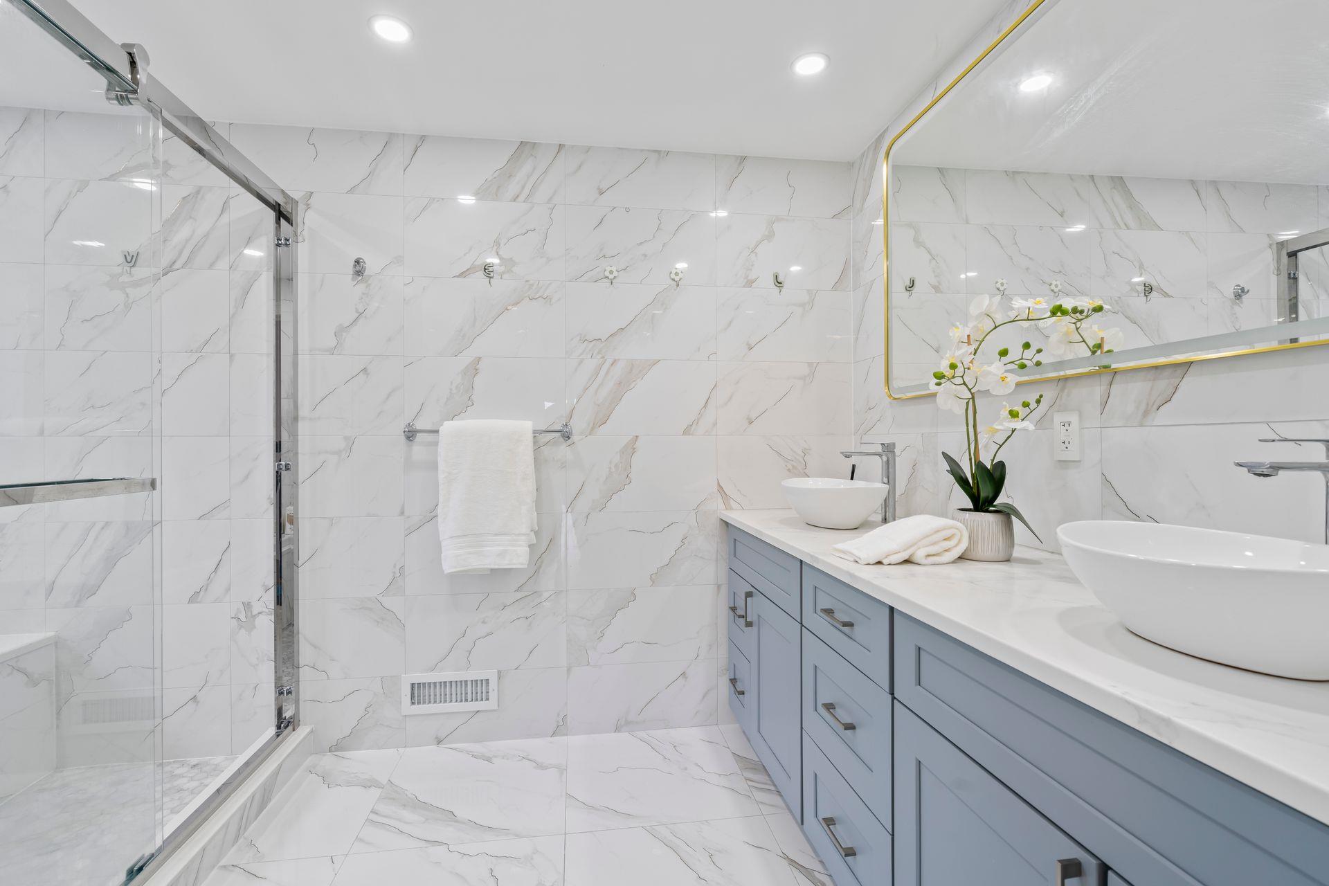 63-41 252nd Street Queens, NY 11362 - Photo 21 of 39 a bathroom with a double vanity sink mirror and shower