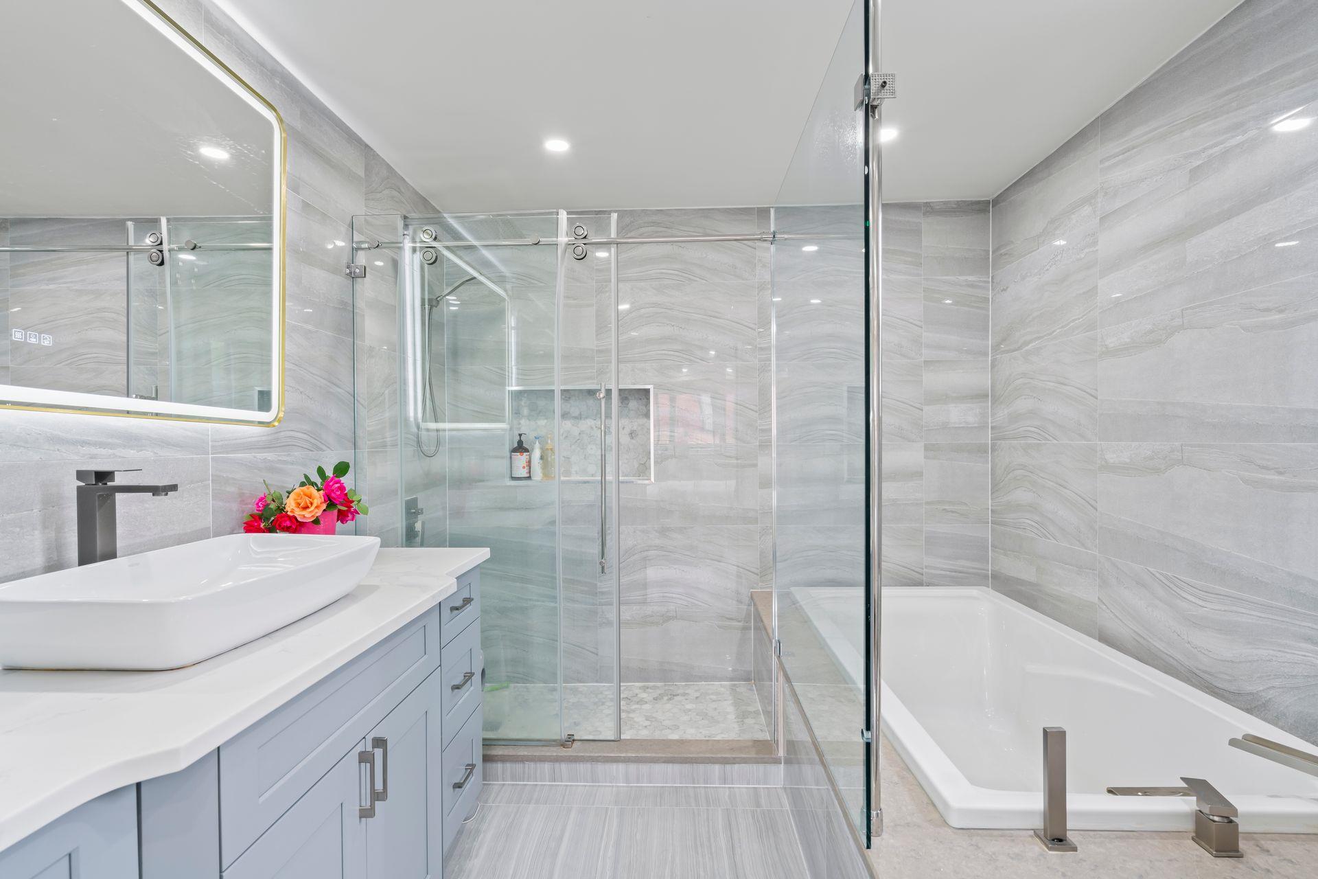 63-41 252nd Street Queens, NY 11362 - Photo 28 of 39 a bathroom with a sink and a shower