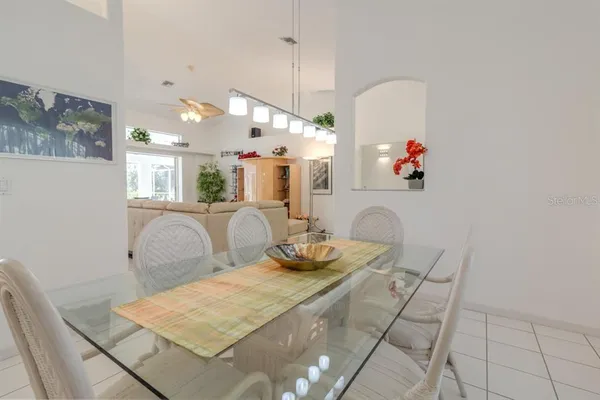 a room with furniture and a chandelier