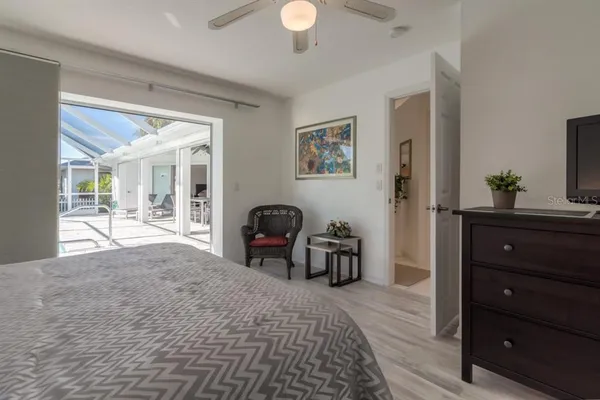 a bedroom with a bed and a dresser