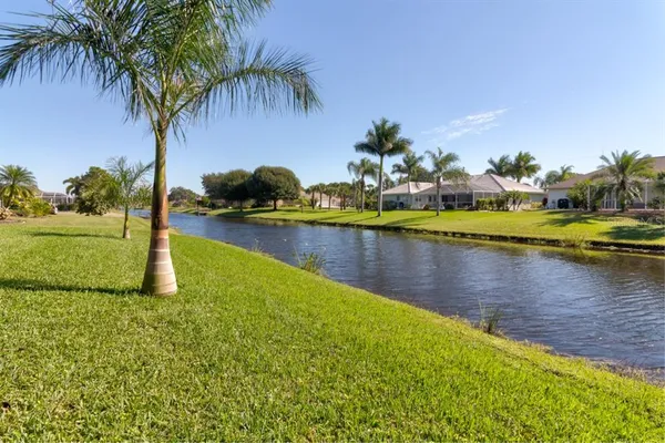 a view of a lake with a house
