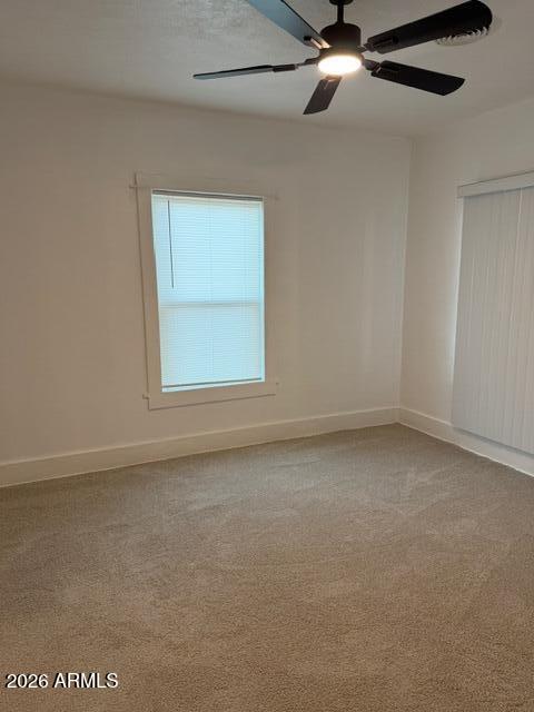 1129 11th Street Douglas, AZ 85607 - Photo 6 of 13 an empty room with a window