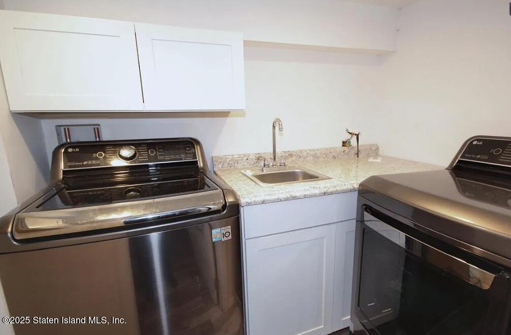 53 Raritan Avenue Staten Island, NY 10304 - Photo 35 of 48 Washer and Dryer Basement