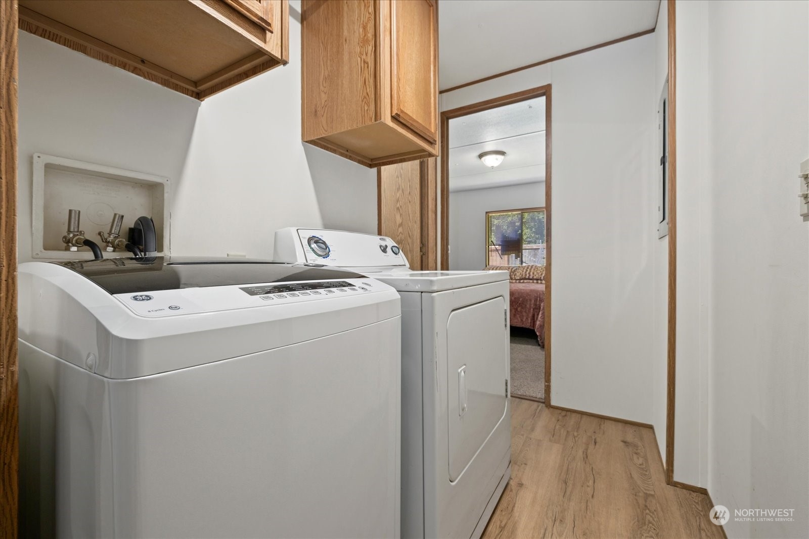 2302 R Street Southeast, Unit 46 Auburn, WA 98002 - Photo 19 of 25 a room that has a washer and dryer