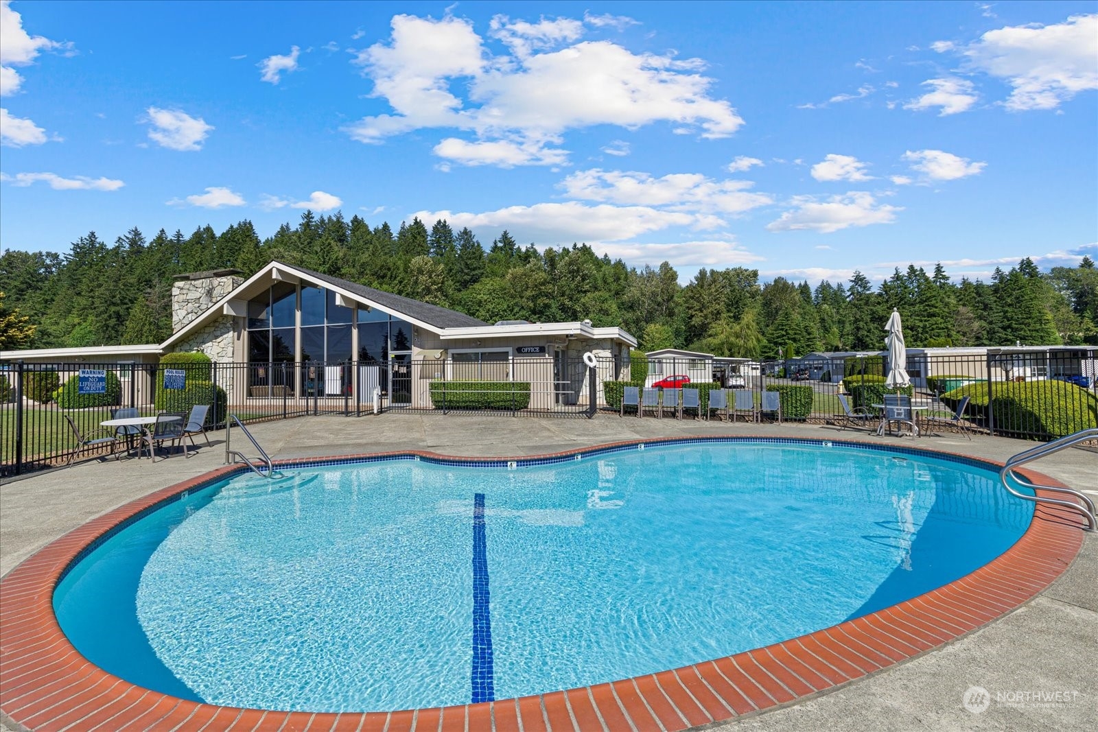 2302 R Street Southeast, Unit 46 Auburn, WA 98002 - Photo 25 of 25 a view of a house with pool