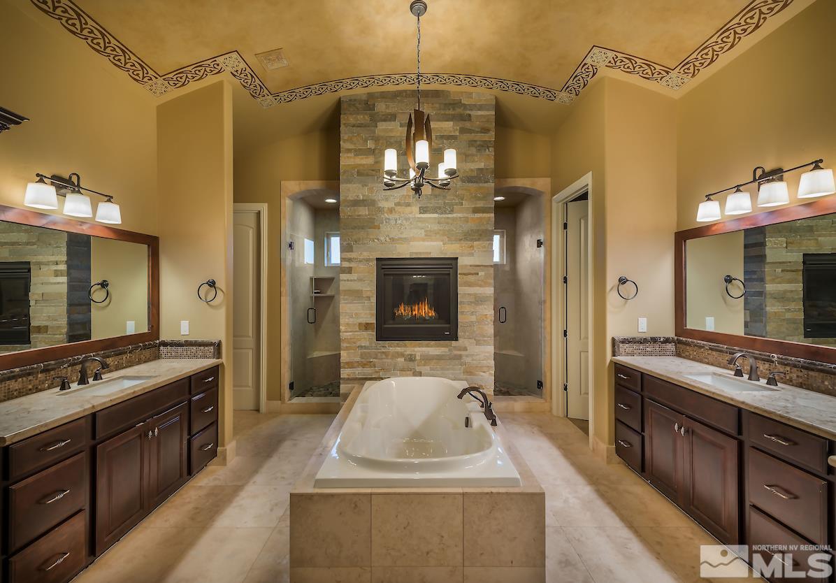 12745 Silver Wolf Road Reno, NV 89511 - Photo 14 of 21 a view of a kitchen with a sink and a refrigerator