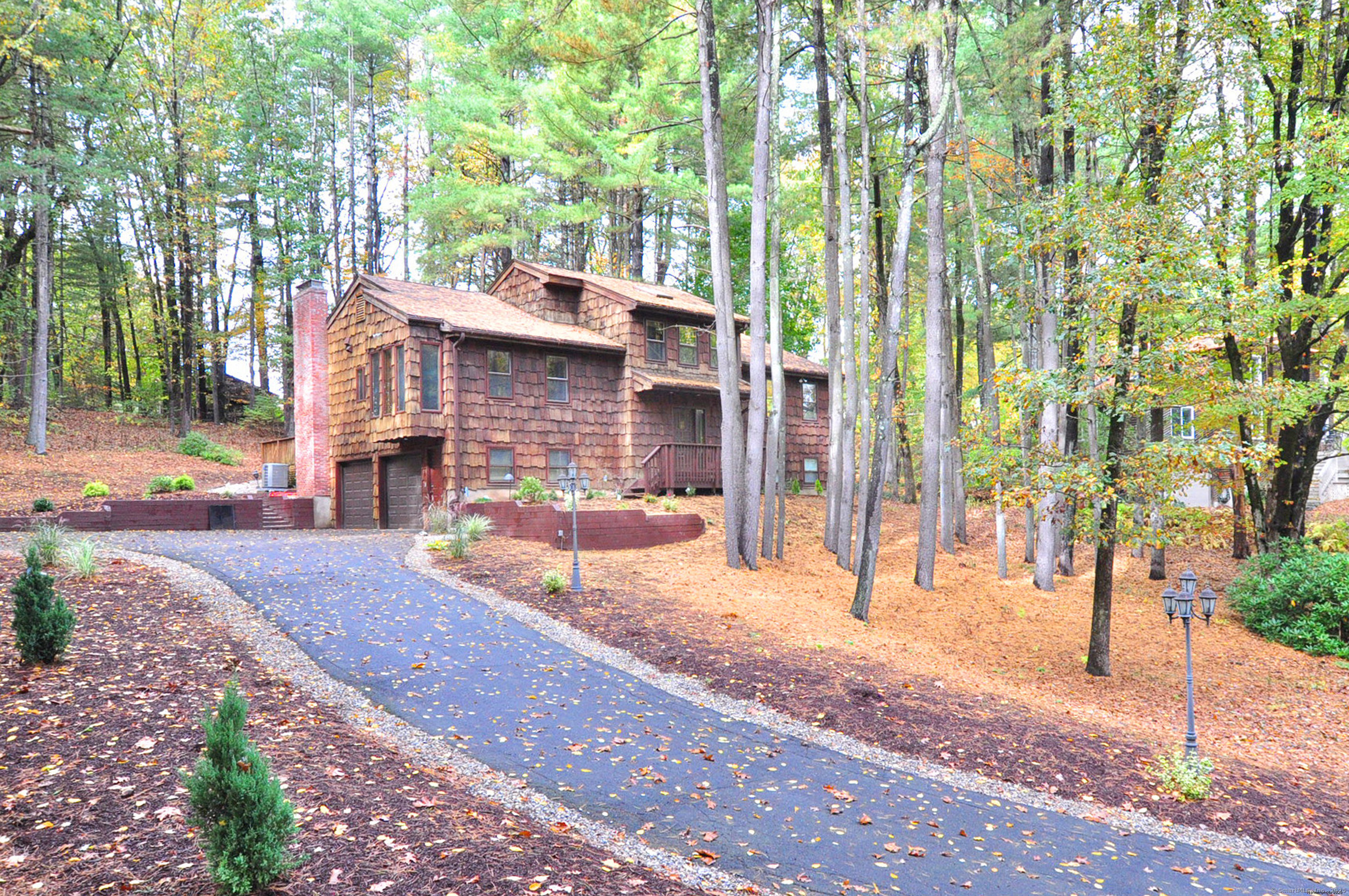 39 Woodduck Farms Road Windsor, CT 06095 - Photo 1 of 1 a view of a house with backyard and a tree