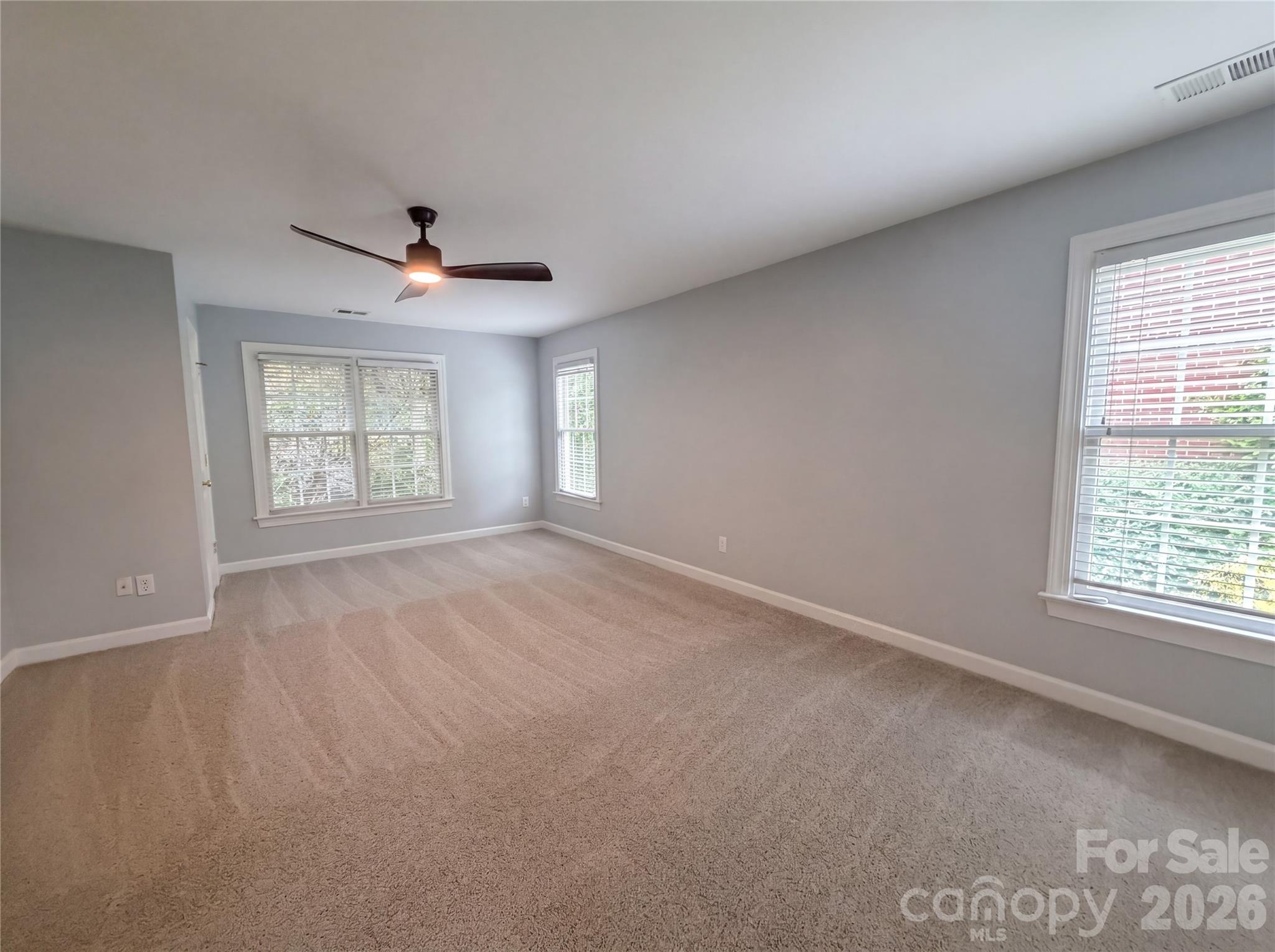 12341 Willingdon Road Huntersville, NC 28078 - Photo 11 of 17 a view of an empty room with a window