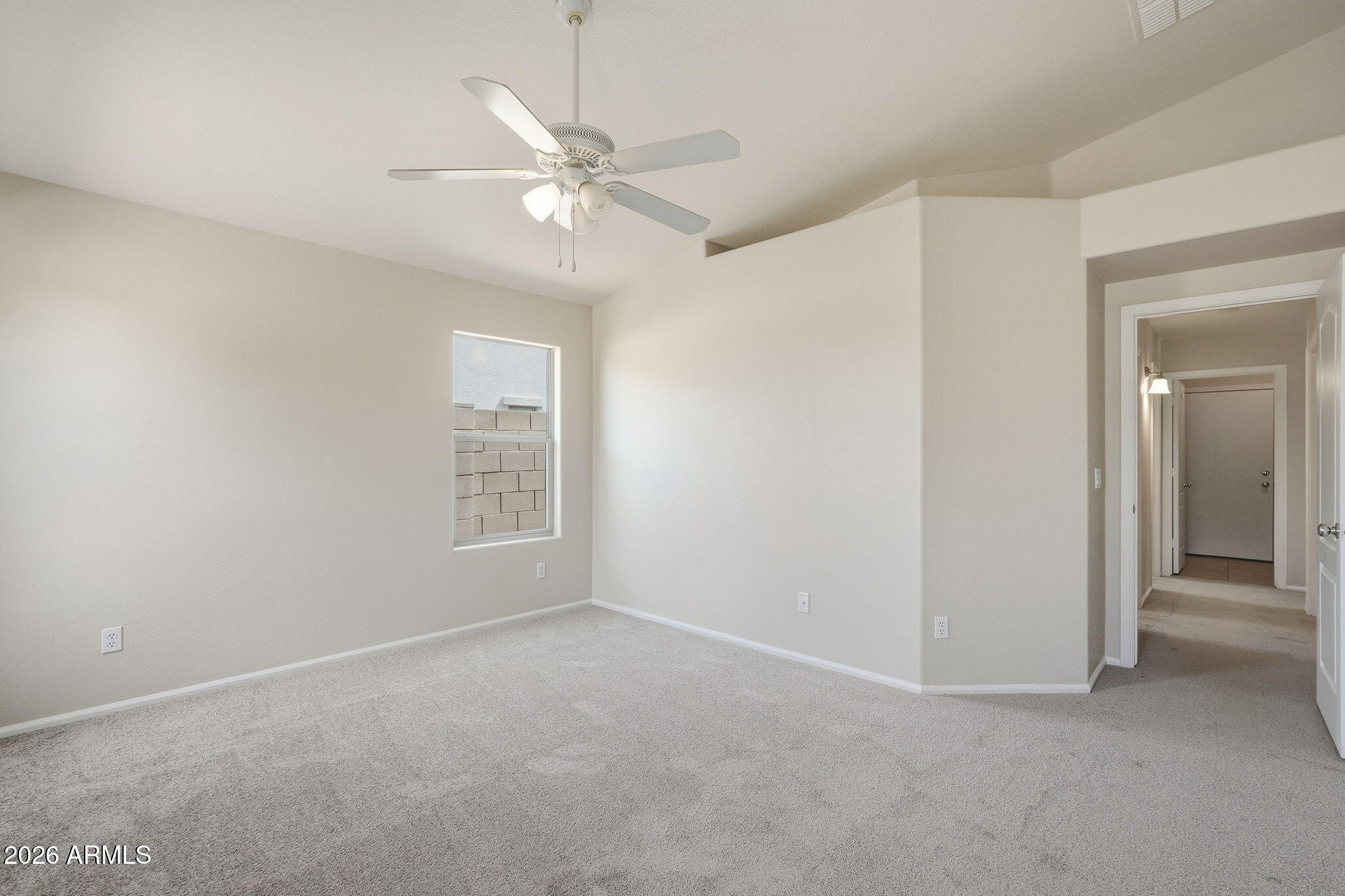 2022 South 160th Lane Goodyear, AZ 85338 - Photo 19 of 36 an empty room with fan and windows