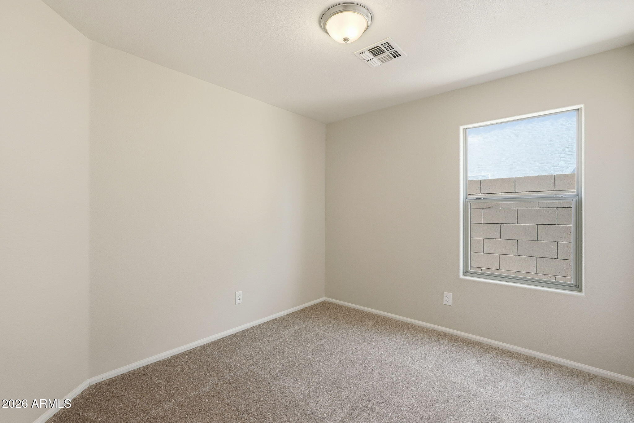 2022 South 160th Lane Goodyear, AZ 85338 - Photo 20 of 36 an empty room with windows