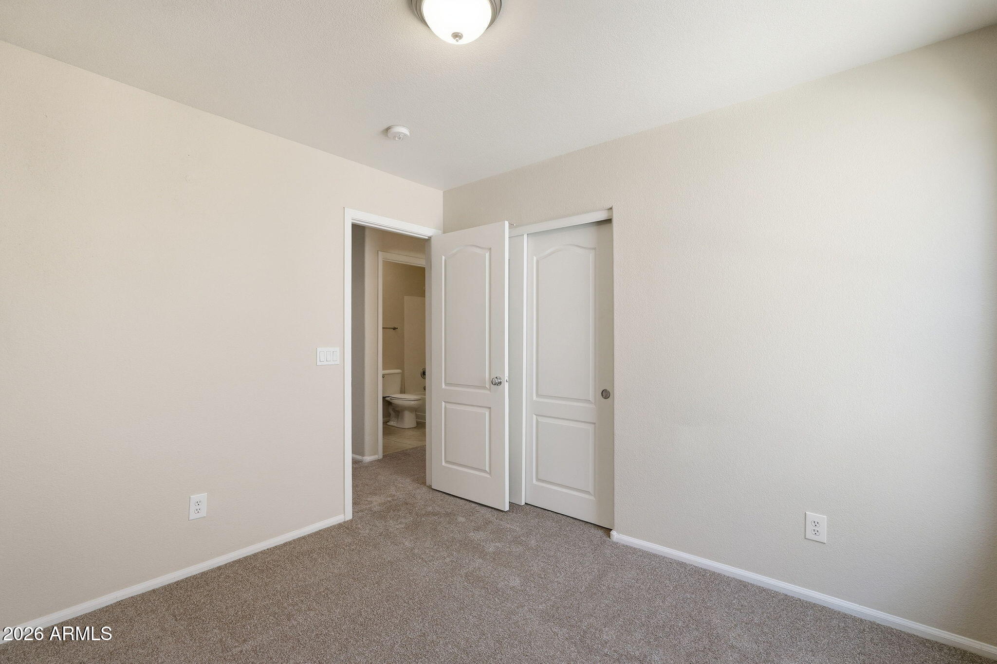 2022 South 160th Lane Goodyear, AZ 85338 - Photo 23 of 36 an empty room with closet area