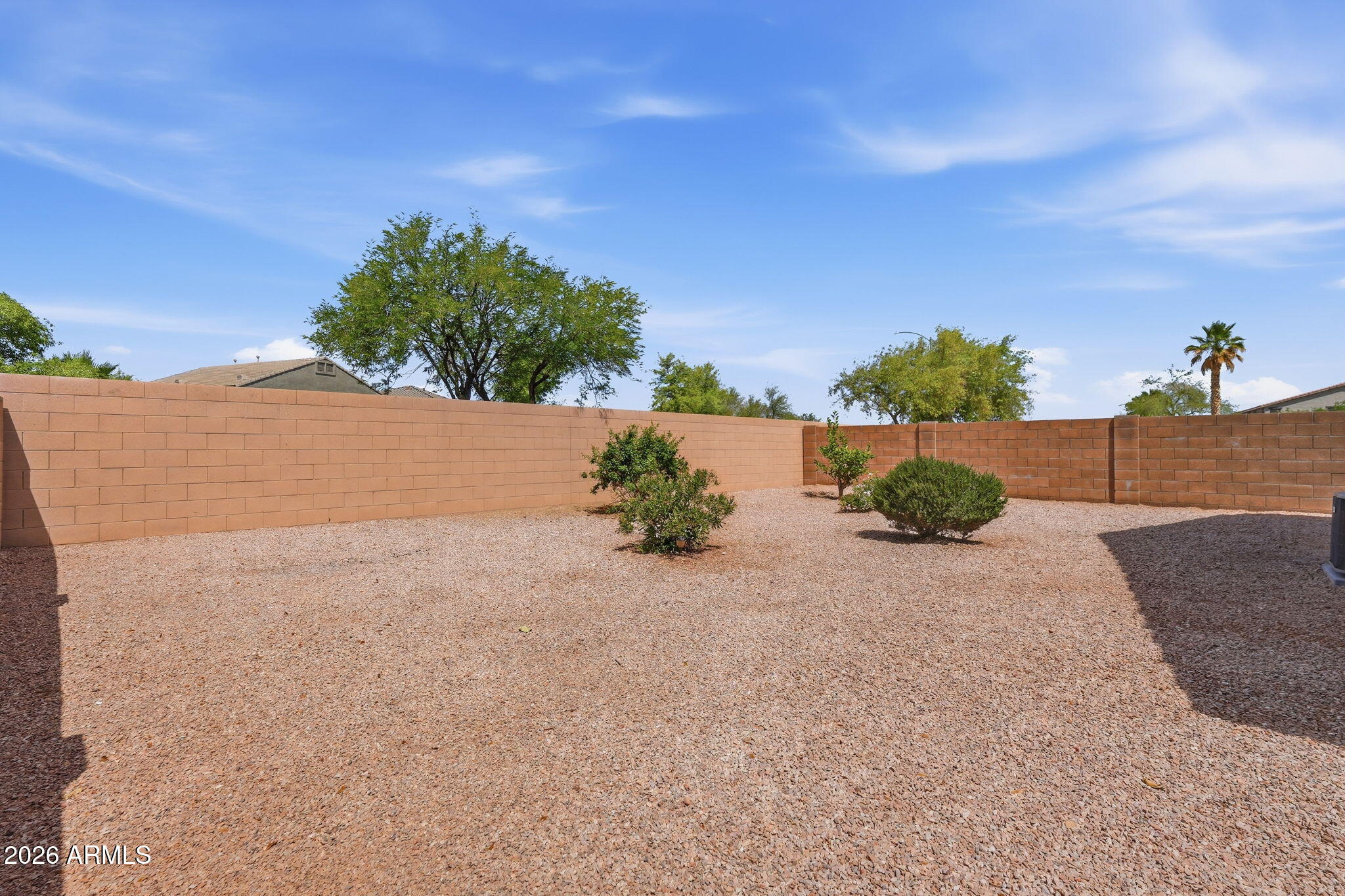 2022 South 160th Lane Goodyear, AZ 85338 - Photo 32 of 36 front view of a house with a yard