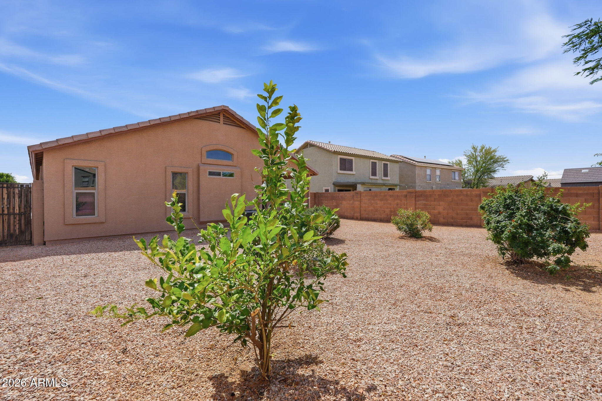 2022 South 160th Lane Goodyear, AZ 85338 - Photo 34 of 36 front view of a house with a yard