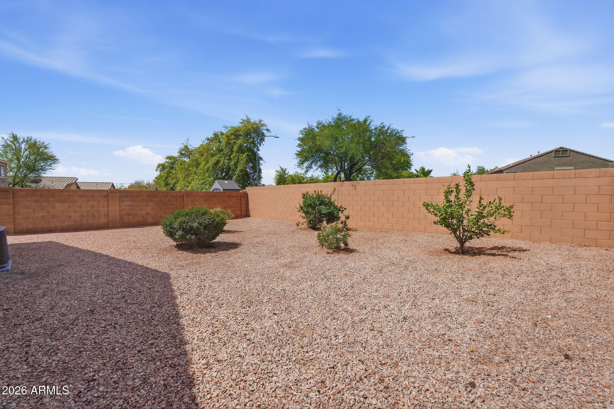 2022 South 160th Lane Goodyear, AZ 85338 - Photo 35 of 36 a view of a street with a view of house