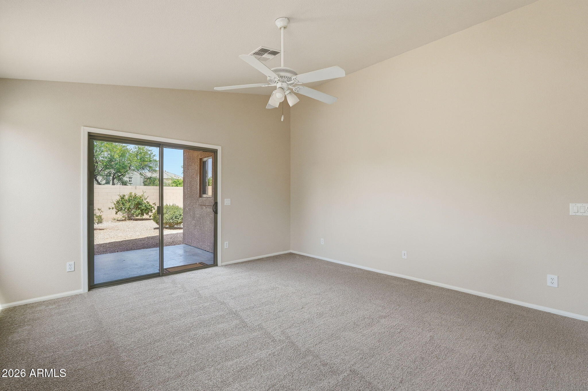 2022 South 160th Lane Goodyear, AZ 85338 - Photo 8 of 36 an empty room with fan