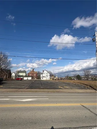 a view of a building with a street