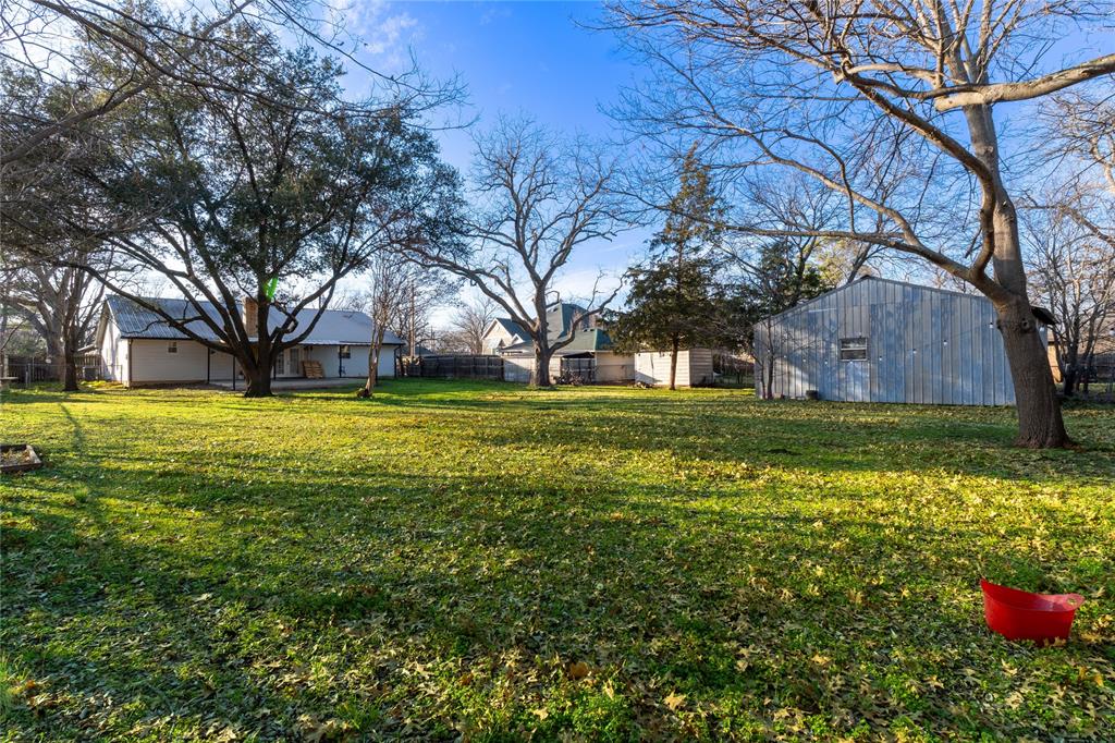 313 South Prairie Street Pilot Point, TX 76258 - Photo 15 of 16 a view of a volley ball court