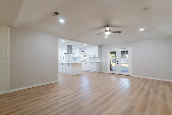 a view of kitchen with wooden floor