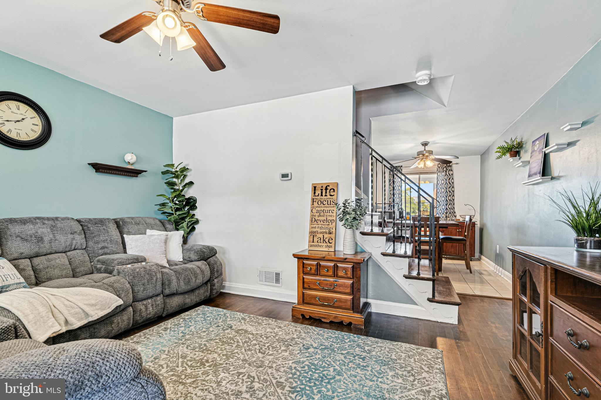 8272 Kavanagh Road Baltimore, MD 21222 - Photo 4 of 32 a living room with furniture and wooden floor