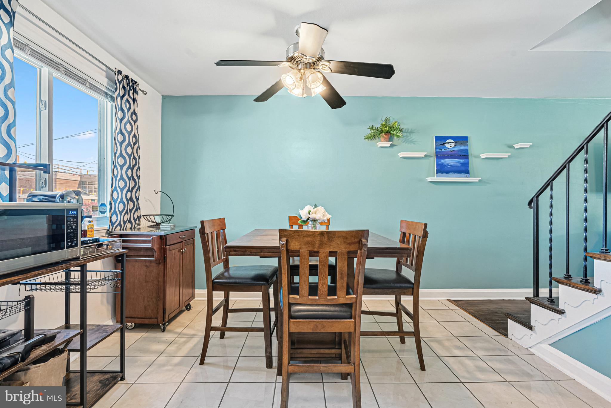 8272 Kavanagh Road Baltimore, MD 21222 - Photo 10 of 32 a view of a livingroom with furniture and a window
