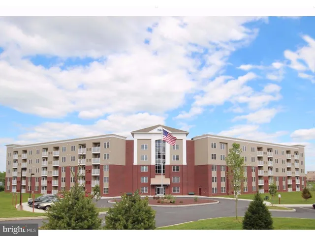 a view of building with yard