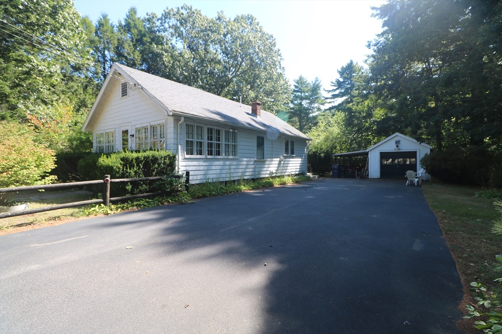 27 Henry Street Sharon, MA 02067 - Photo 17 of 19 a view of house with outdoor space and garden