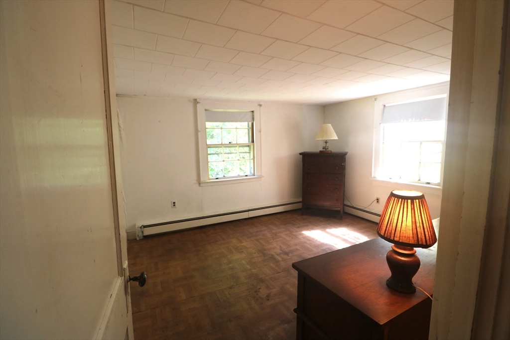 27 Henry Street Sharon, MA 02067 - Photo 5 of 19 an empty room with windows