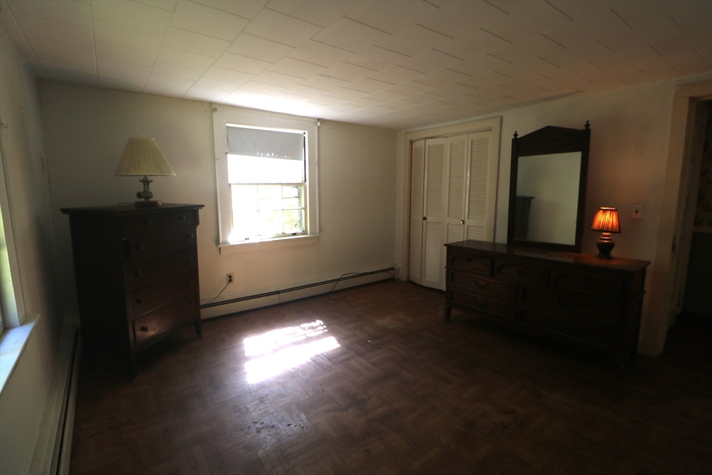 27 Henry Street Sharon, MA 02067 - Photo 6 of 19 a living room with hard wood floor