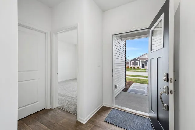 a view of a bedroom from the hallway