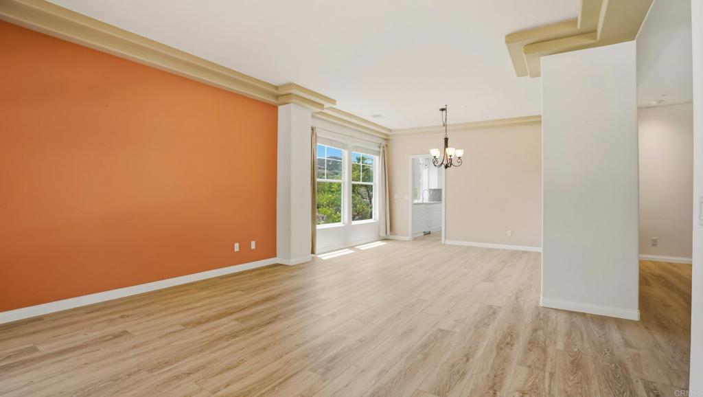 2527 Southern Oak Road Ramona, CA 92065 - Photo 15 of 56 a view of a room with wooden floor and windows
