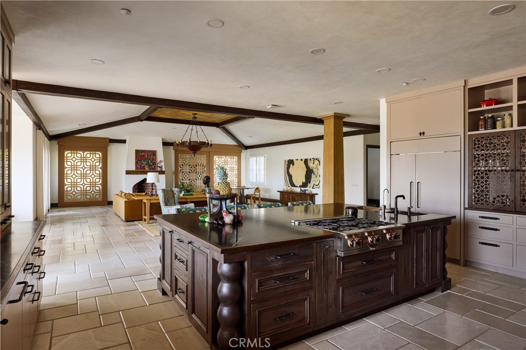 2019 Polo Court Riverside, CA 92506 - Photo 11 of 26 There is ample cabinetry, butler's pantry, walk-in pantry and coffee bar all custom designed with premium finishes.