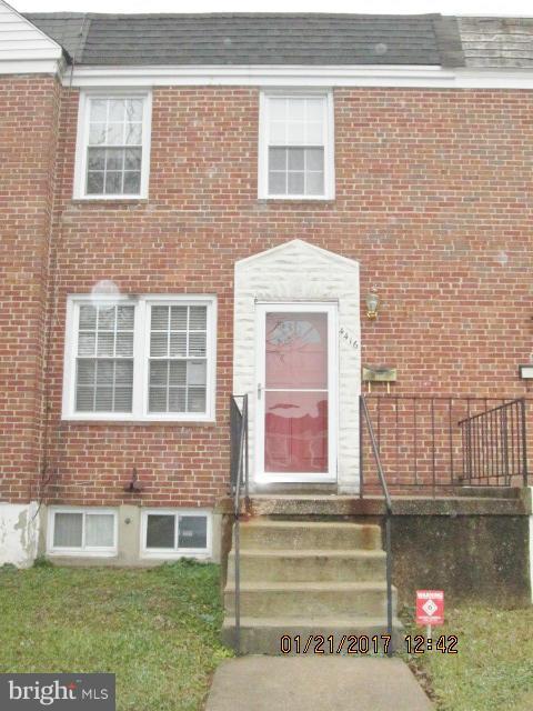 4416 Eldone Road Baltimore, MD 21229 - Photo 1 of 21 a front view of a house with a garden