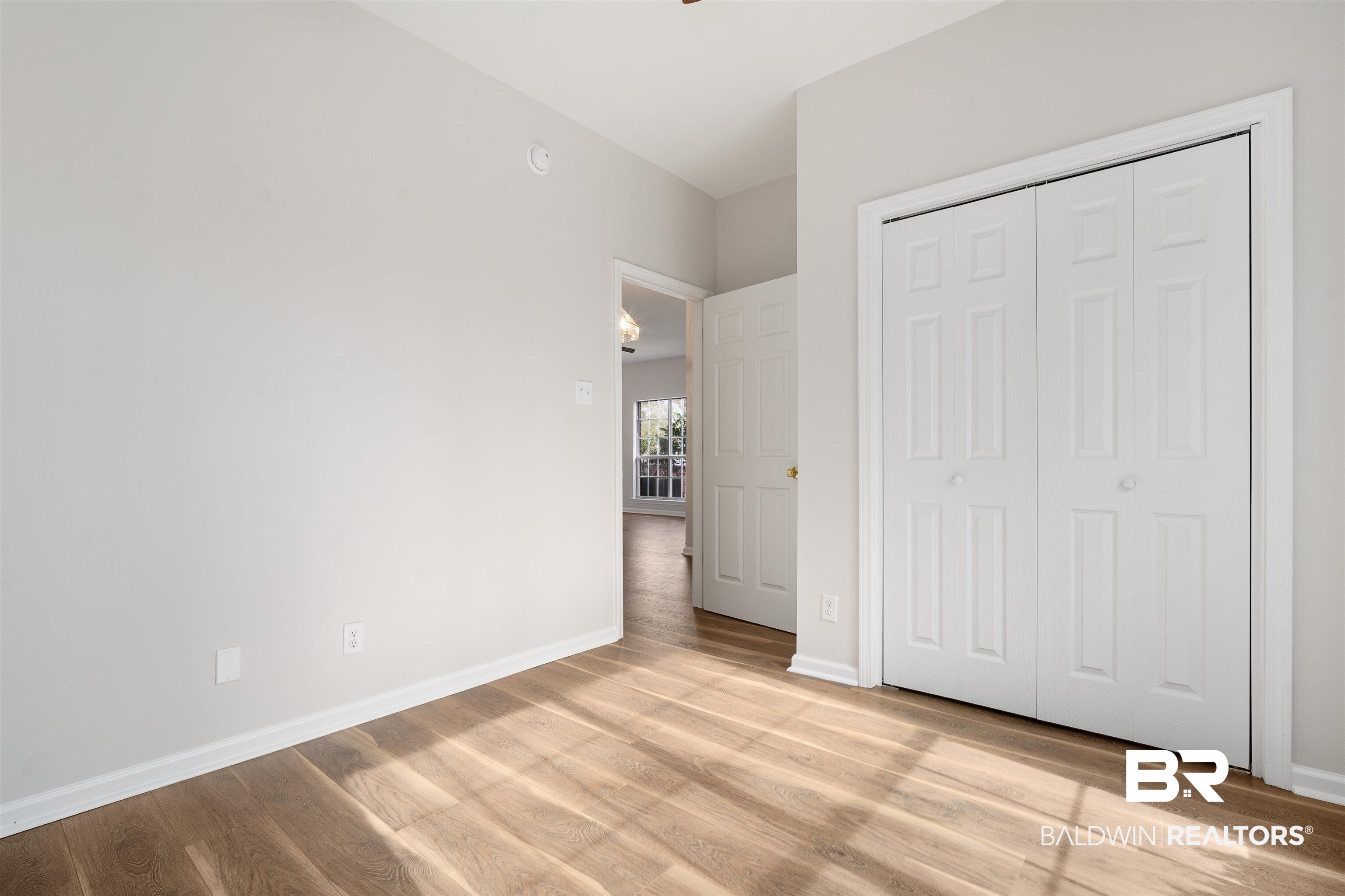 250 North Spring Lake Drive Mobile, AL 36695 - Photo 23 of 29 Front bedroom with new double closet doors.